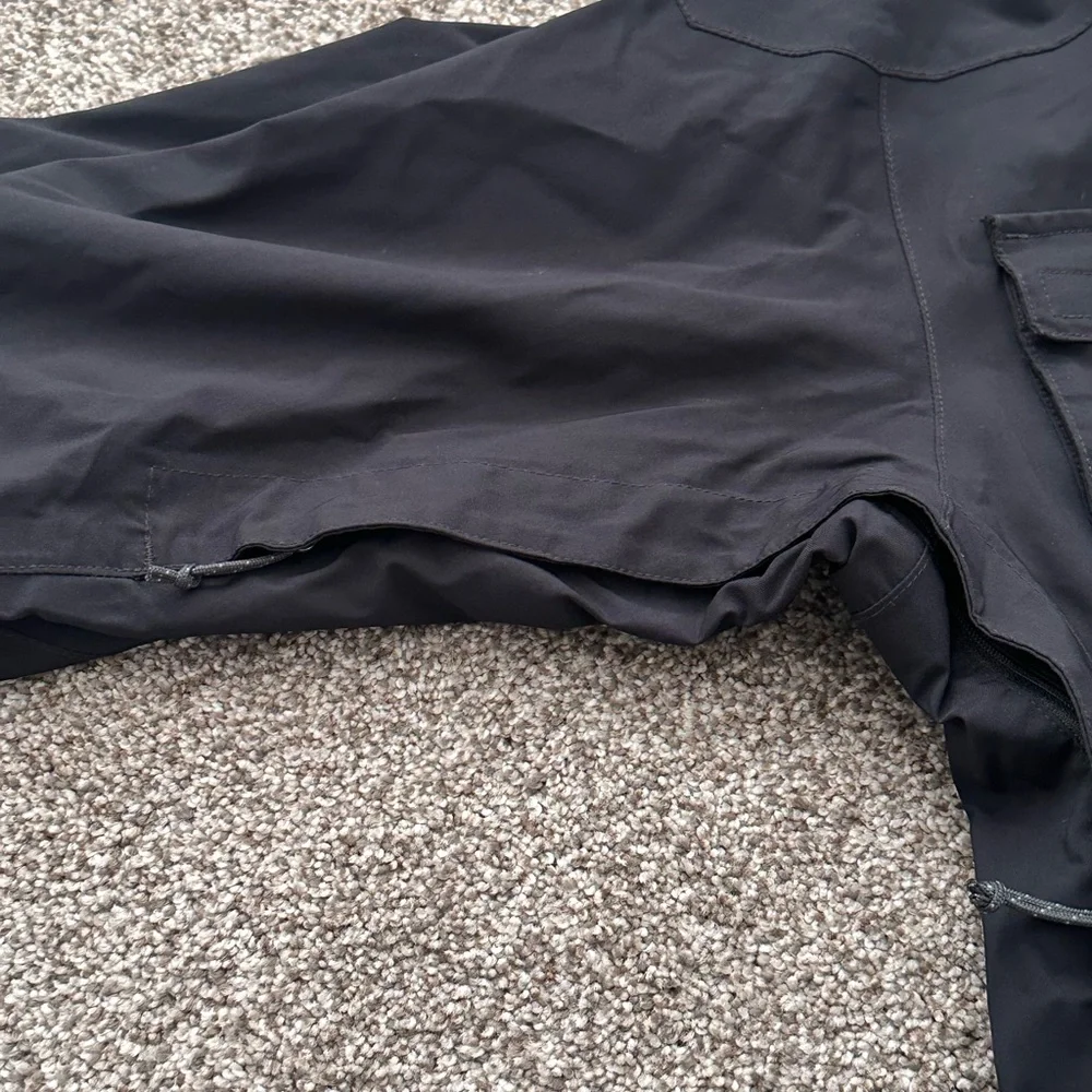 The North Face Black Hooded Raincoat with Multiple Front Pockets